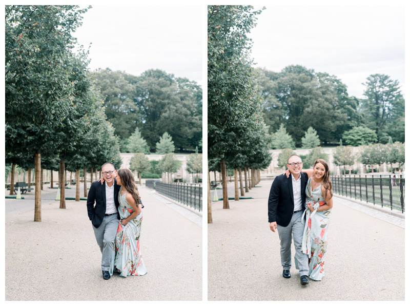 Couple having fun during engagement photos at Longwood Gardens