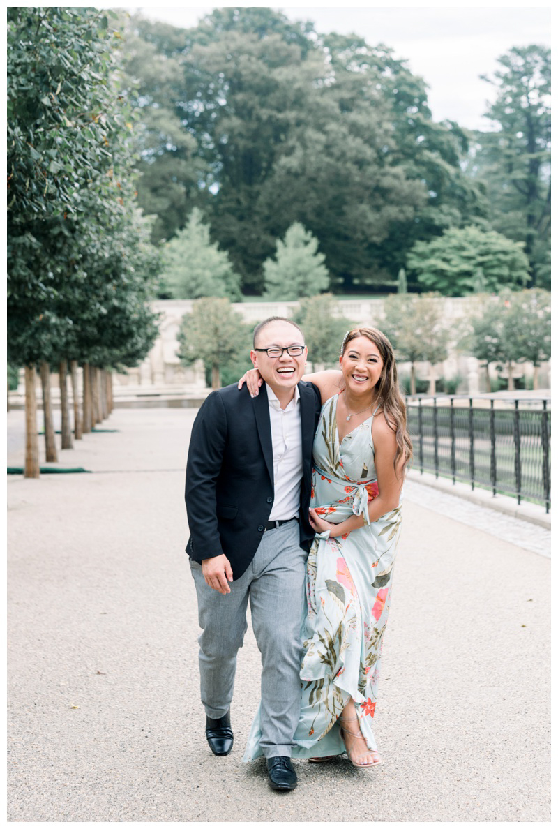 Laughing couple at Longwood Gardens engagement photo shoot