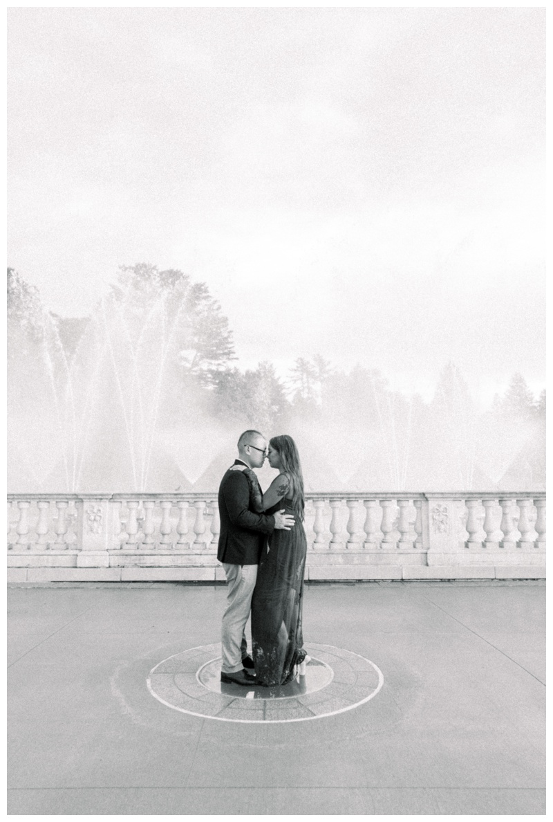 Black and white fountain engagement photo