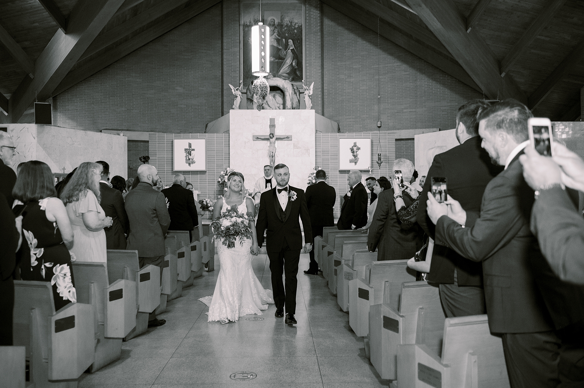 couple walks up aisle after wedding ceremony in New Jersey