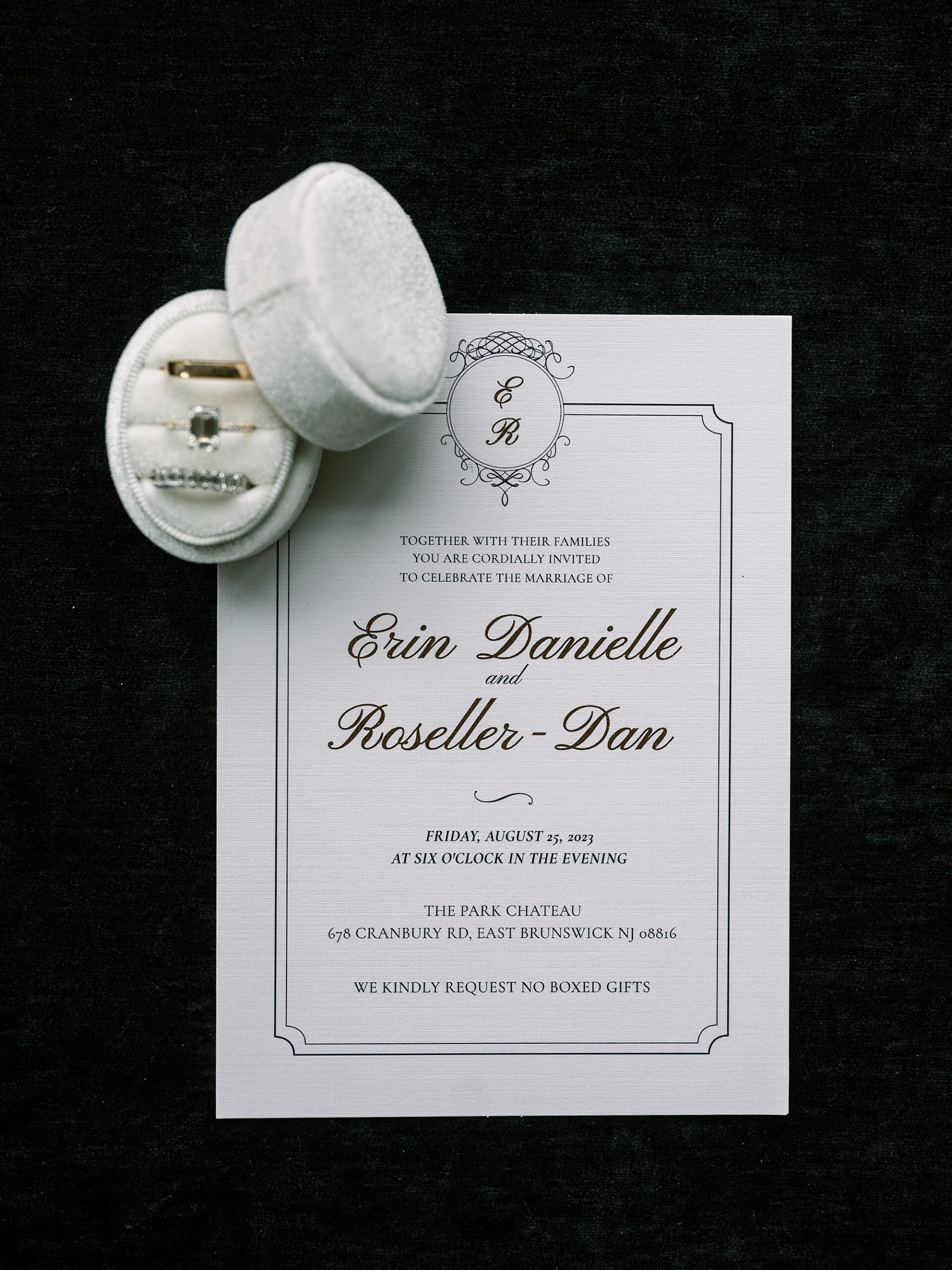 black and white invitation suite with ring box