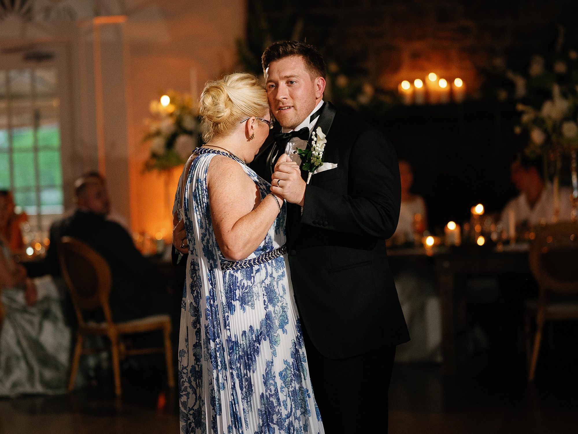 groom and mother dance during wedding reception at the Bronxville Field Club